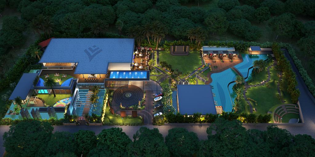 Clubhouse at dusk with pool and landscaped gardens